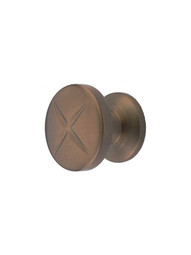 Southport Round X Knob - 1 3/8 inch Diameter in Brushed Bronze.
